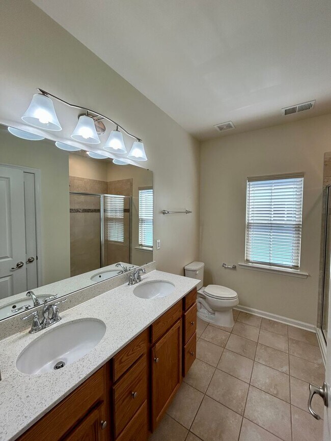 Building Photo - Captivating Craftsman style residence, nestled in the serene Wynwood Section of Fox Creek Subdivi...
