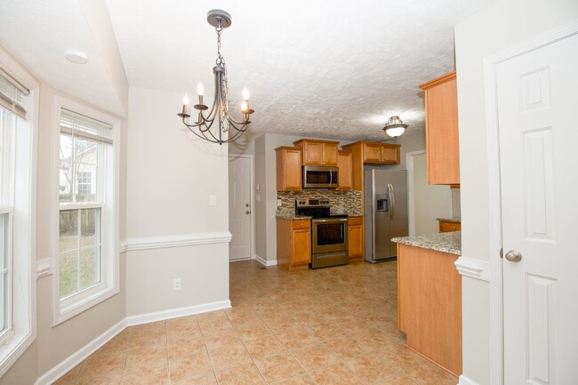 Building Photo - "Charming 4-Bedroom Home with Granite Coun...