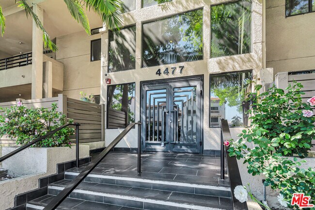 Building Photo - 4477 Woodman Ave