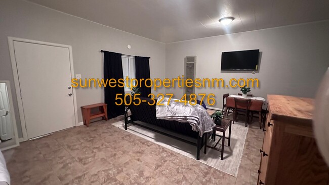 Building Photo - Fully Furnished Studio Apartment