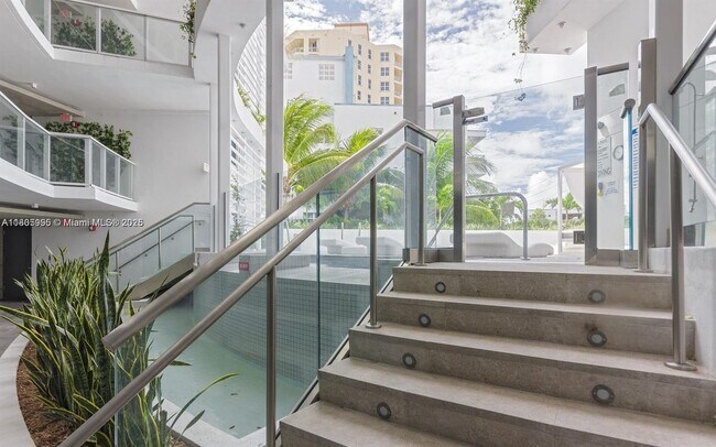 Building Photo - 9821 E Bay Harbor Dr