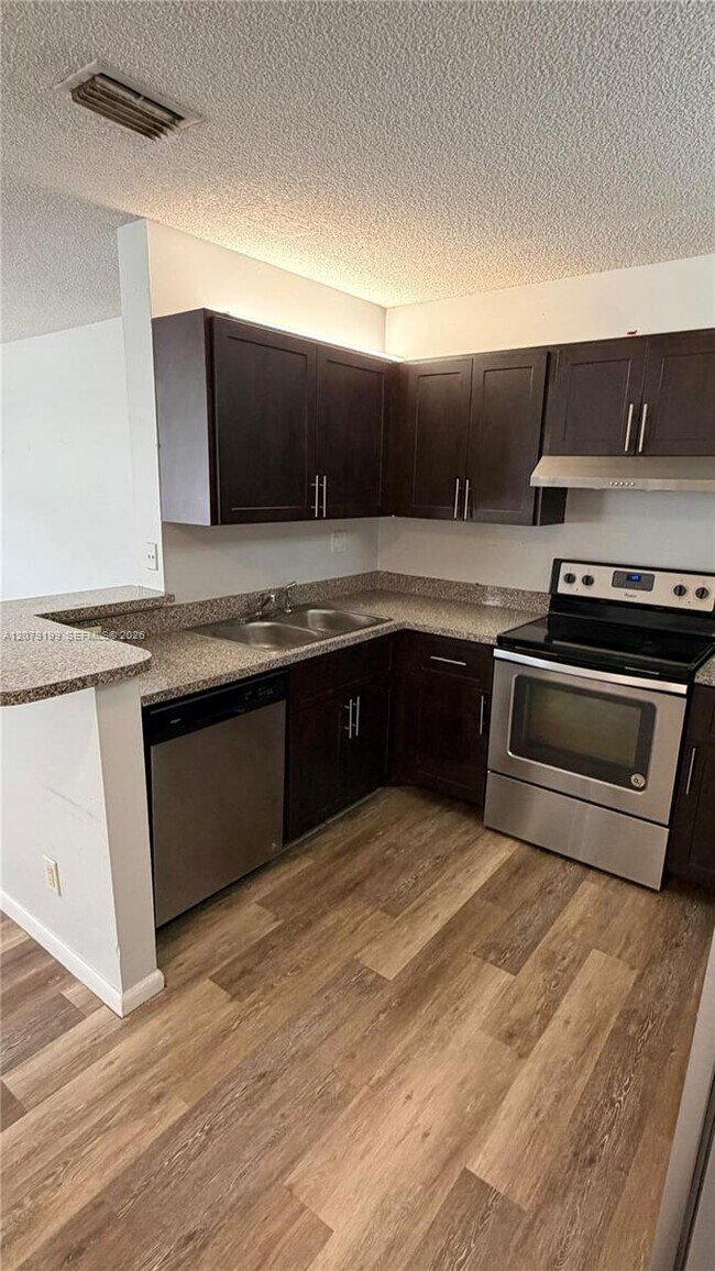 Building Photo - 11641 Royal Palm Blvd