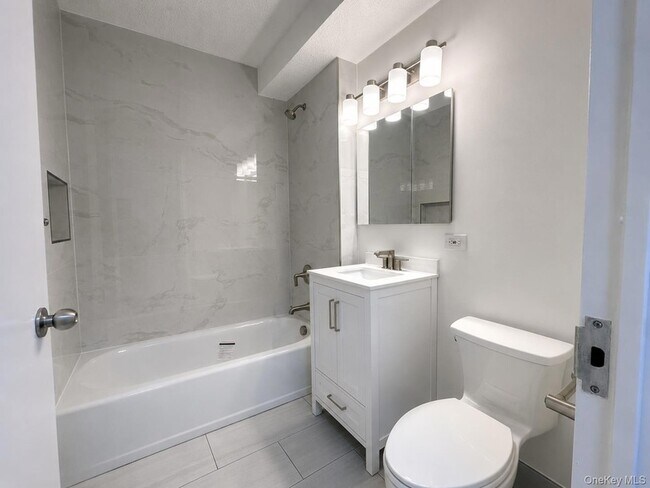 Building Photo - 4-74 48th Avenue Unit 30-J