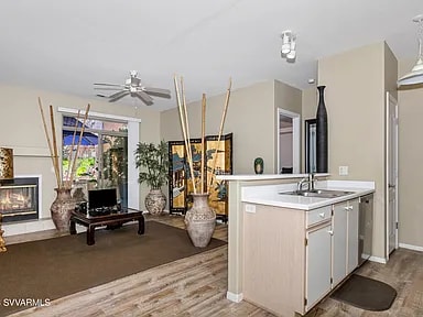 Living room with gas fireplace - 985 E Mingus Ave