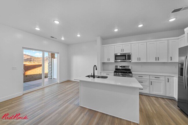 Building Photo - Newly Built 4 Bedroom Townhome!