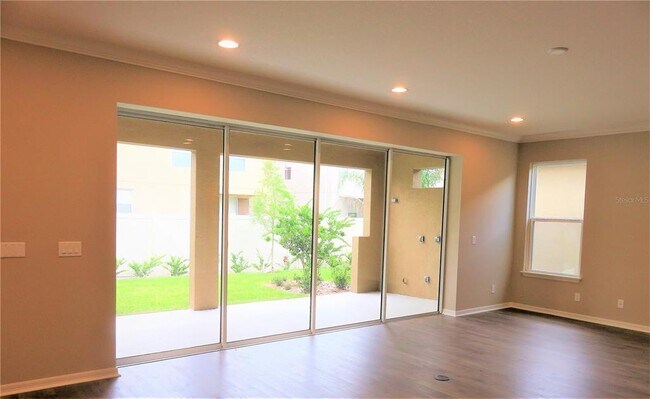 Building Photo - 8828 Tropical Palm Dr