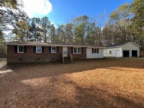 Building Photo - Charming 3BD, 2BA Wake Forest Home on a Large, Private Lot with a Detached 2-Car Garage, Providin...