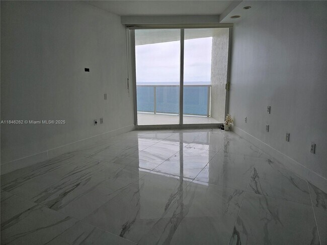 Building Photo - 19111 Collins Ave