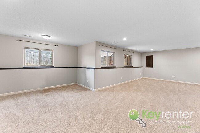 Building Photo - Spacious 4-Bedroom Home with Finished Basement & 3-Car Garage – Derby, KS