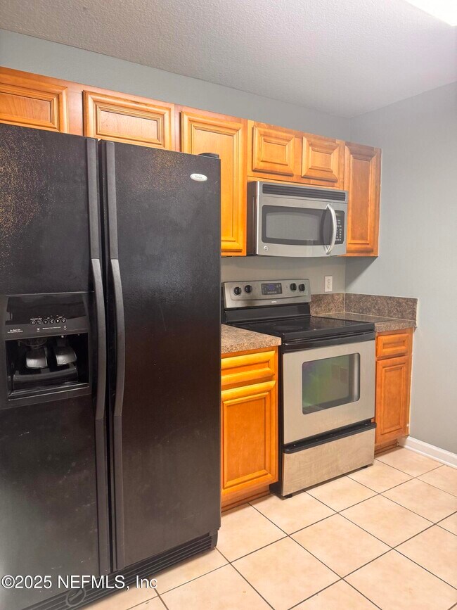 Building Photo - 6984 Ortega Woods Dr