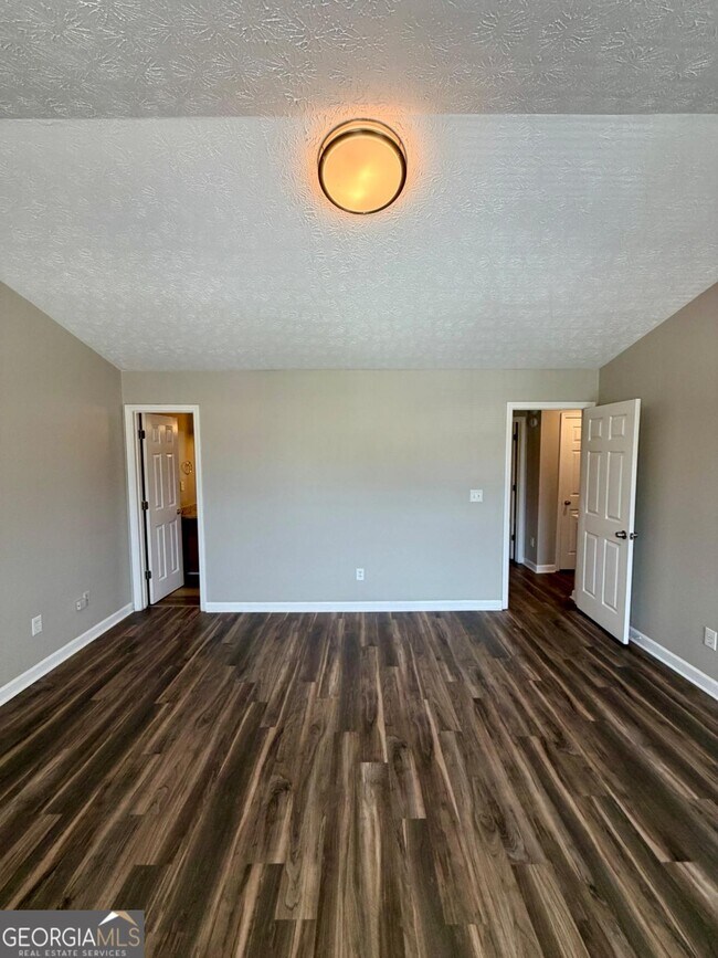Building Photo - 5696 Windfall Ln