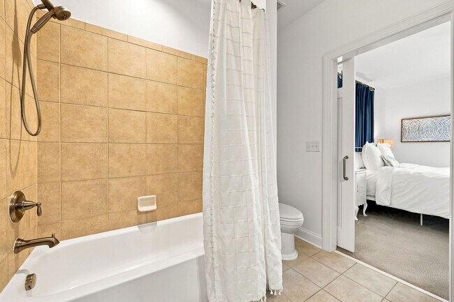 Building Photo - Fully Furnished Option Available | Modern End-Unit Townhome | Prime Raleigh Location