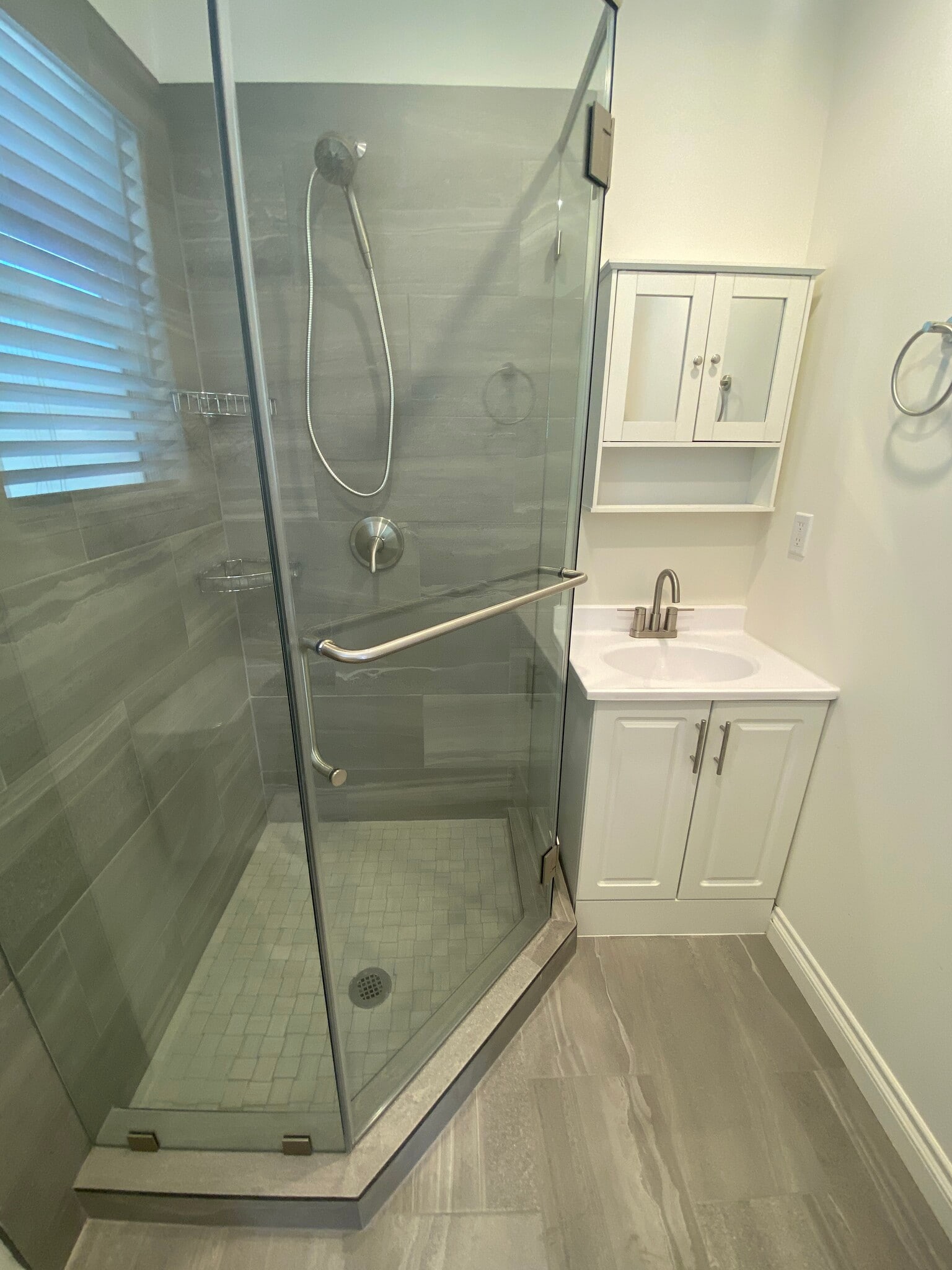 Newly built shower. No window in shower. That’s just a reflection - 2425 N Parish Pl
