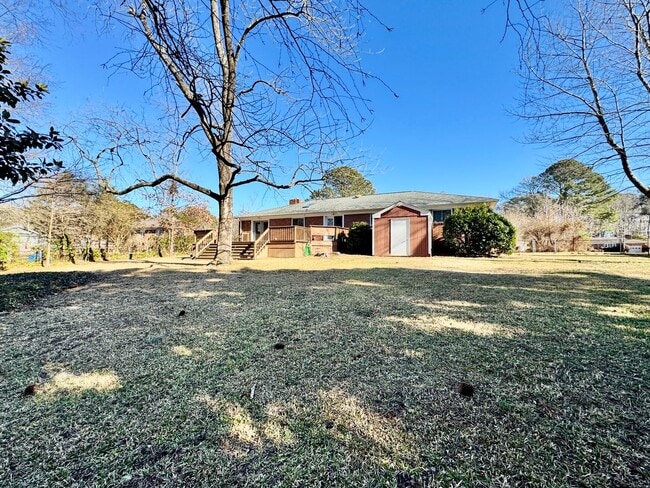 Building Photo - Available NOW! Lakefront 4 Bedroom/2 Bath Home, Pet-Friendly, Fenced Yard, Great School Zones!