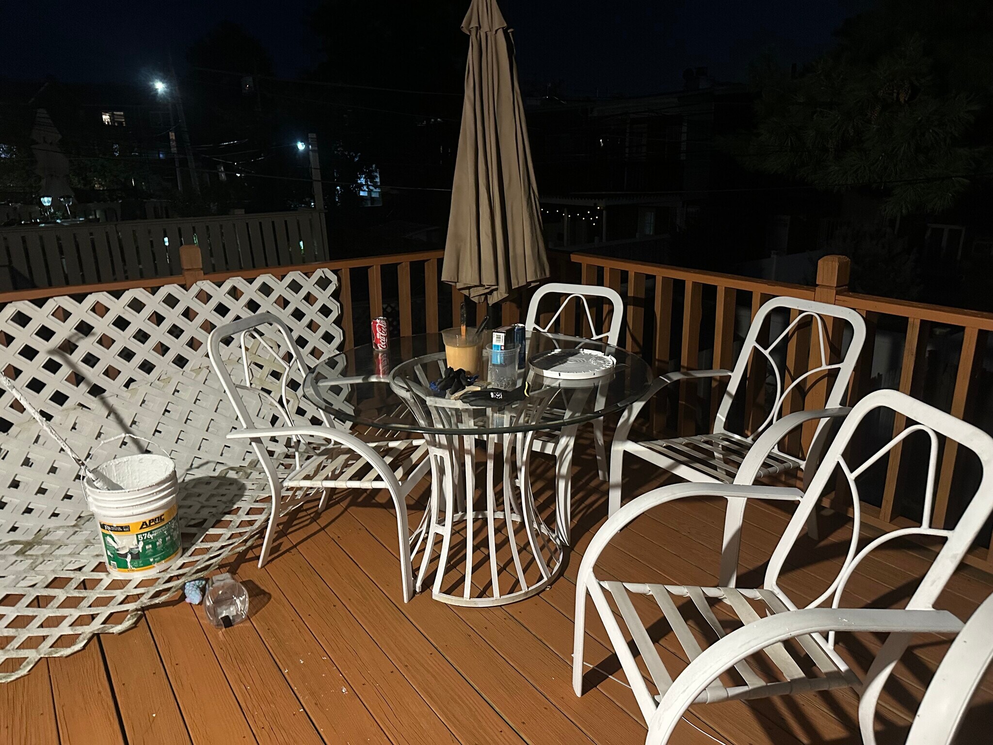 Back deck with table and chair and umbrella - 2370 Brigham St