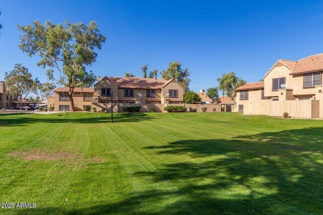 Building Photo - 4601 N 102nd Ave