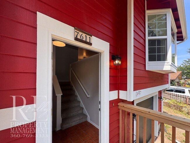 Building Photo - Freshly Painted East Bremerton Home with Expansive Decks & Flexible Living Space