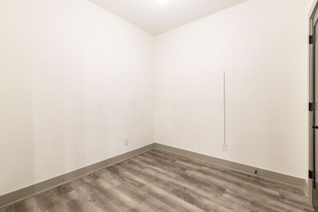 Building Photo - Modern Living Meets Walkable City Charm in...
