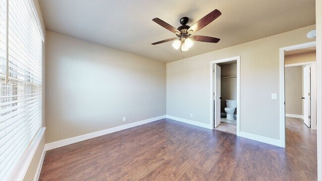 Building Photo - SUNFLOWER TRIPLEX