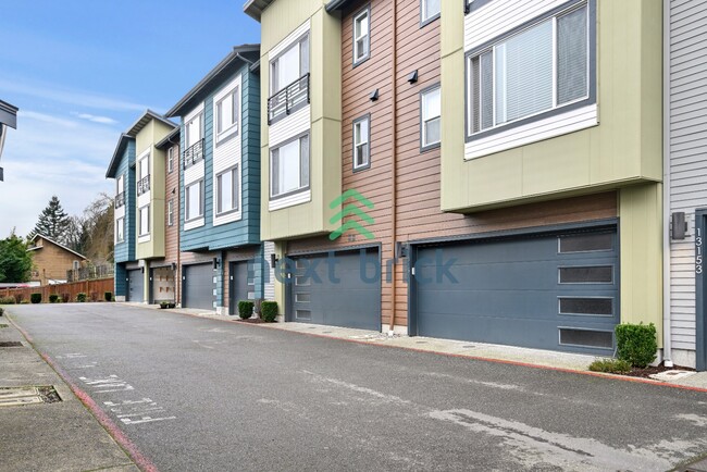 Building Photo - A Beautiful Corner Home Designed for Comfort, Light & Community!