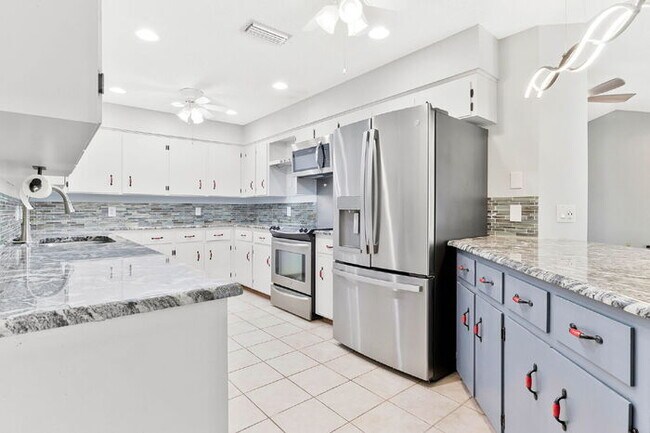 Building Photo - AVAILABLE NOW – $3,000/MONTH – ALL UTILITIES + LAWN SERVICE + POOL SERVICE INCLUDED!