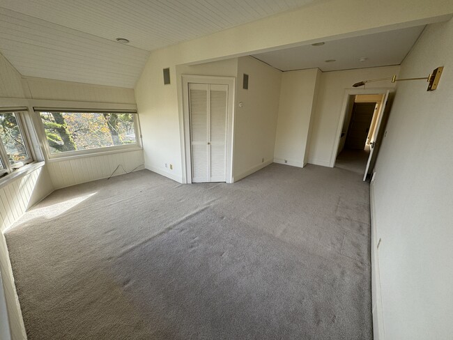 Primary bedroom toward door - 1687 SW Montgomery Dr.