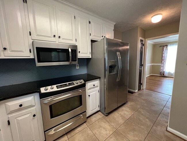 Building Photo - Spacious 5-Bedroom Home on Over Half an Ac...