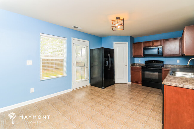 Building Photo - End-Unit 3-Bedroom Townhome