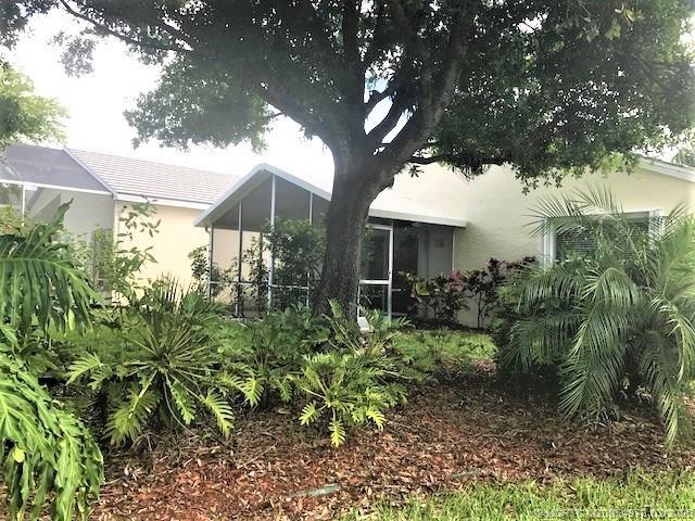 Building Photo - 3486 SW Pindo Palm Ln