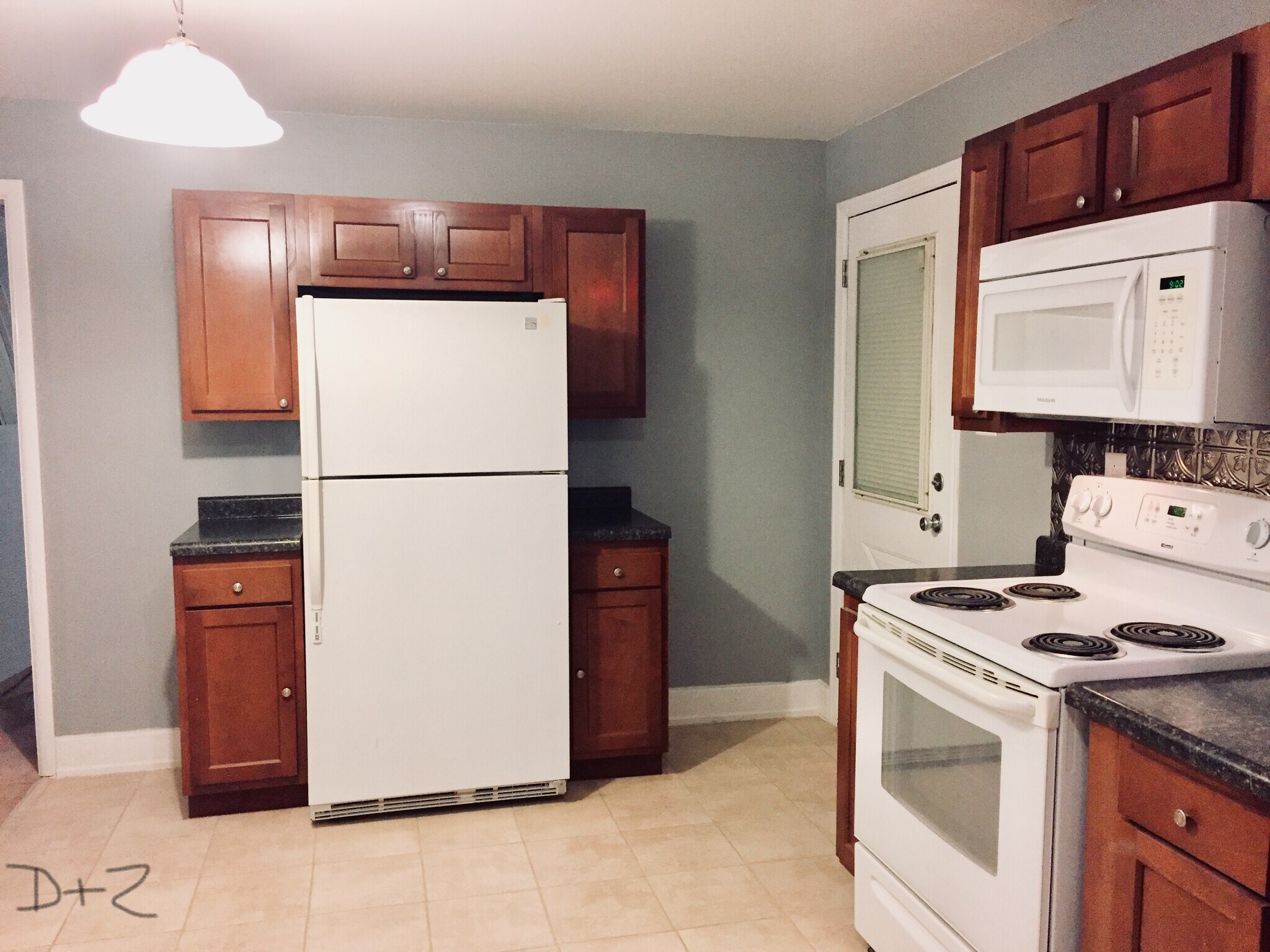 Refrigerator, Stove, and overhead microwave included - 1030 E National Hwy