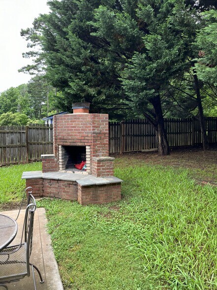Backyard Patio Fireplace - 300 Chuckwood Rd