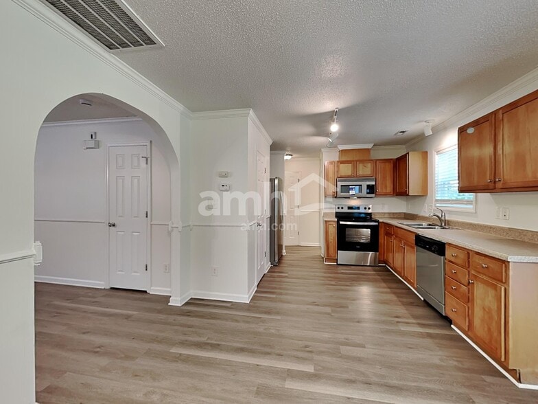 Building Photo - 1302 River Rock Dr