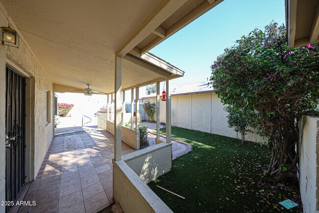 Building Photo - 3408 W Port Au Prince Ln