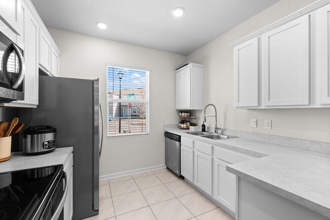 Building Photo - Oakleaf Plantation 3-Bedroom Townhouse in ...