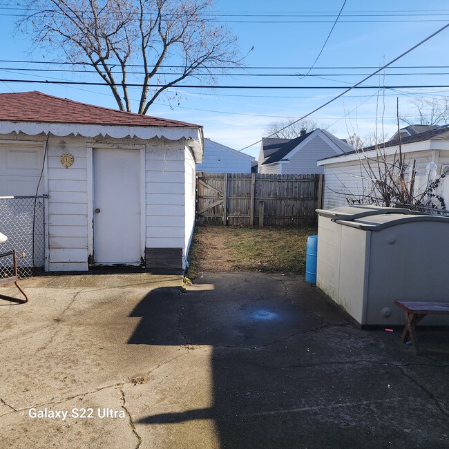 View of fenced backyard from house - 7141 Jackson Ave