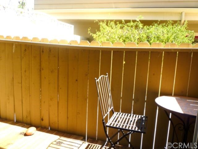 Private outdoor patio with new fence. Patio furniture included - 3647 Jasmine Ave