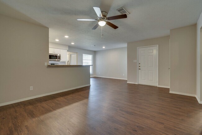 view of kitchen and dining area from living area - 1233 Cordell St