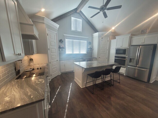 Building Photo - Spacious 4BR Home with Inground Pool, Open Split Floor Plan & Side-Entry Garage