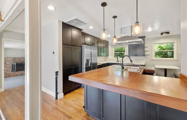 Building Photo - Beautiful home with Studio coming soon!