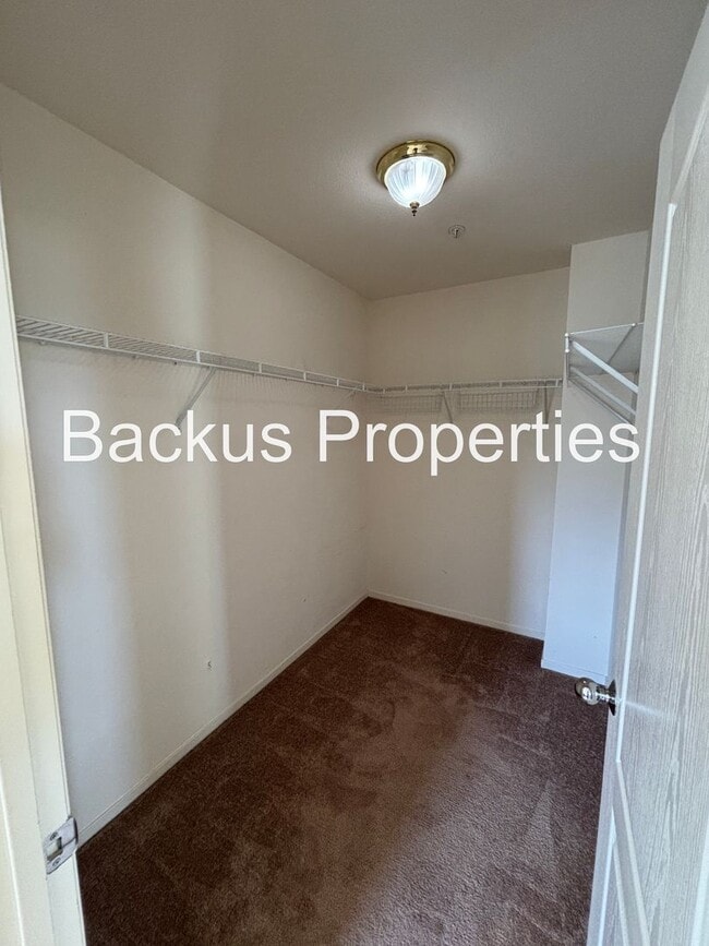 Building Photo - Great two-level home in Las Palmas II with scenic views