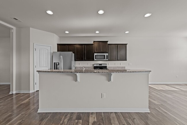 Building Photo - Spacious 5 Bedroom Home with 2-Car Garage,...