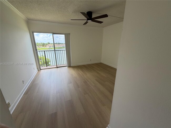 Building Photo - 8560 N Sherman Cir