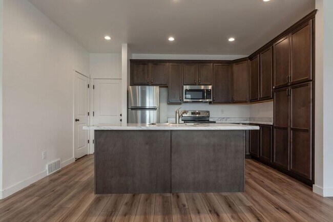 Building Photo - Beautiful Row End Townhouse w 2 car attached