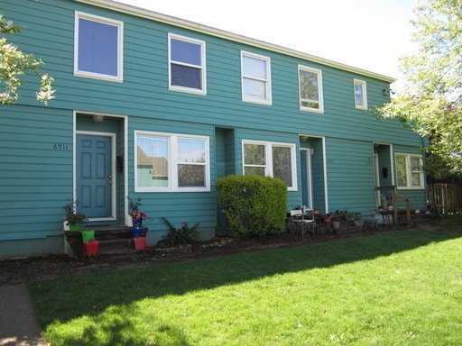 Building Photo - 6909-6923 N Vancouver Ave