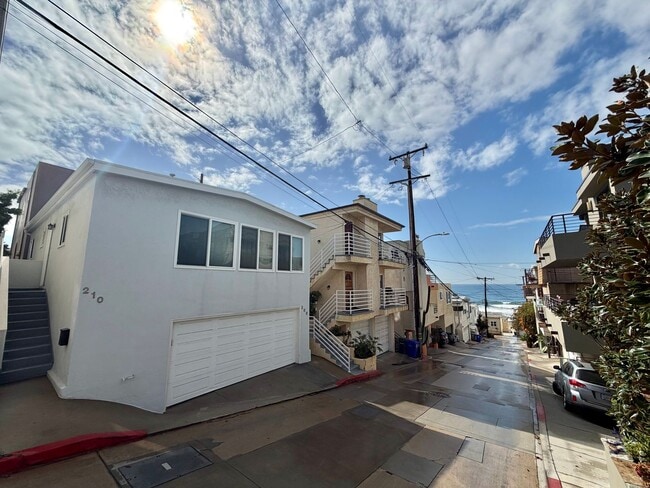 Building Photo - Beachside Living Just One Block from the Sand – Updated 1BD with Garage Parking