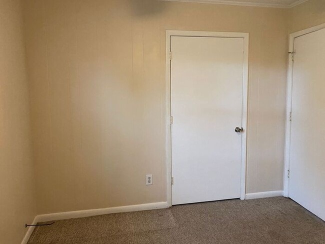 Building Photo - COMING SOON! 4Br, 2.5 baths, large kitchen, large bedrooms, fence, storage and more! N. College R...