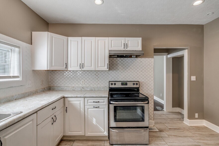 Kitchen comes with stove & fridge - 717 N Grant Ave