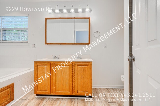 Building Photo - 9229 Howland Rd