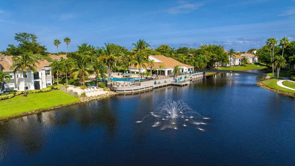 The View unveils a symphony of calm waters, tropical allure, and a tranquil haven. Immerse yourself in the delightful serenade of waterside living. - The View at Water's Edge