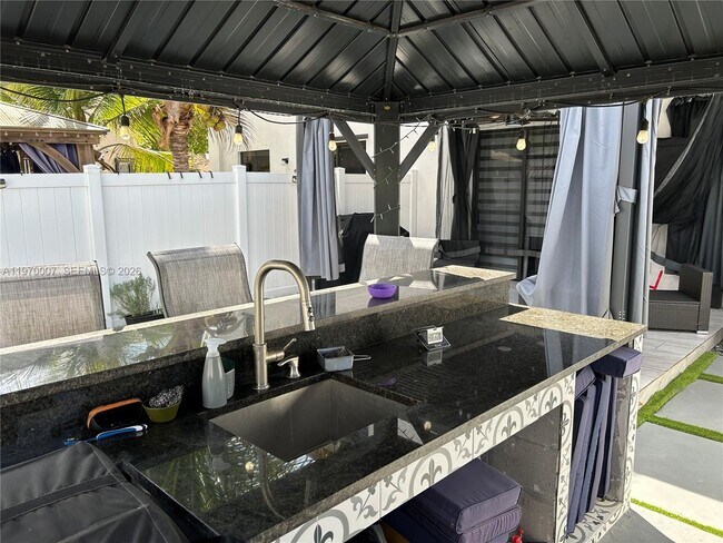 Building Photo - 10371 West 33rd Ct